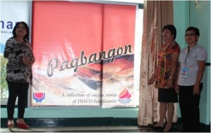 (From L-R) SLP RPC Elizabeth Saavedra, Kalahi-CIDSS RPC Marilyn Fabian and ARDO Consejo H. Usman pose shortly after unveiling the life-size Pagbangon Book Cover.